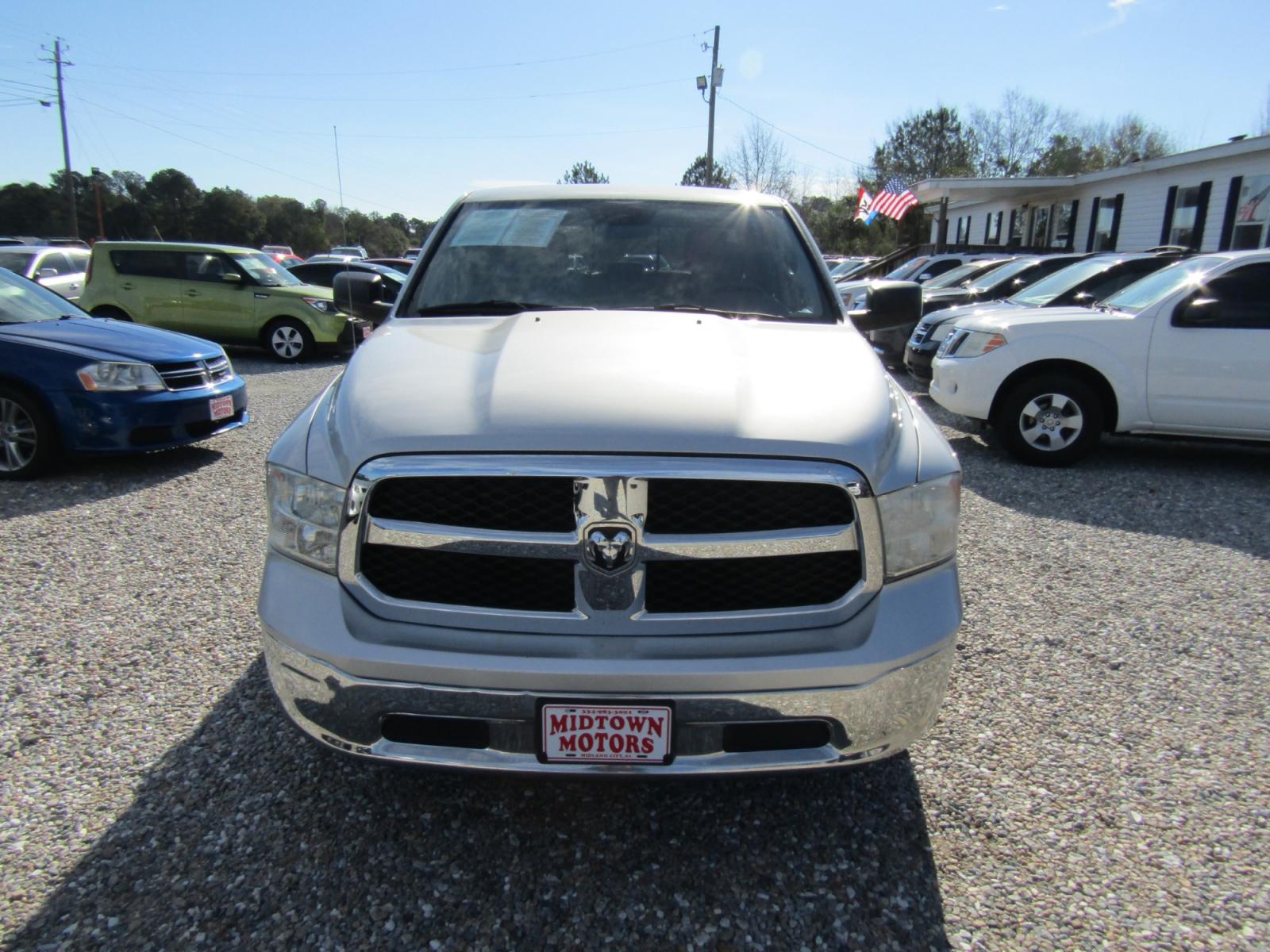 2013 Silver RAM 1500 SLT Crew Cab 2WD (1C6RR6LG9DS) with an 3.6L V6 engine, Automatic transmission, located at 15016 S Hwy 231, Midland City, AL, 36350, (334) 983-3001, 31.306210, -85.495277 - Photo #1